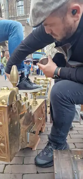 A close view of shoeshining outdoors.